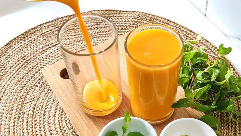 Pour your mango lassi into serving glasses